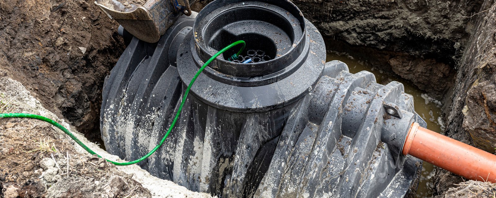 déboucher une fosse septique