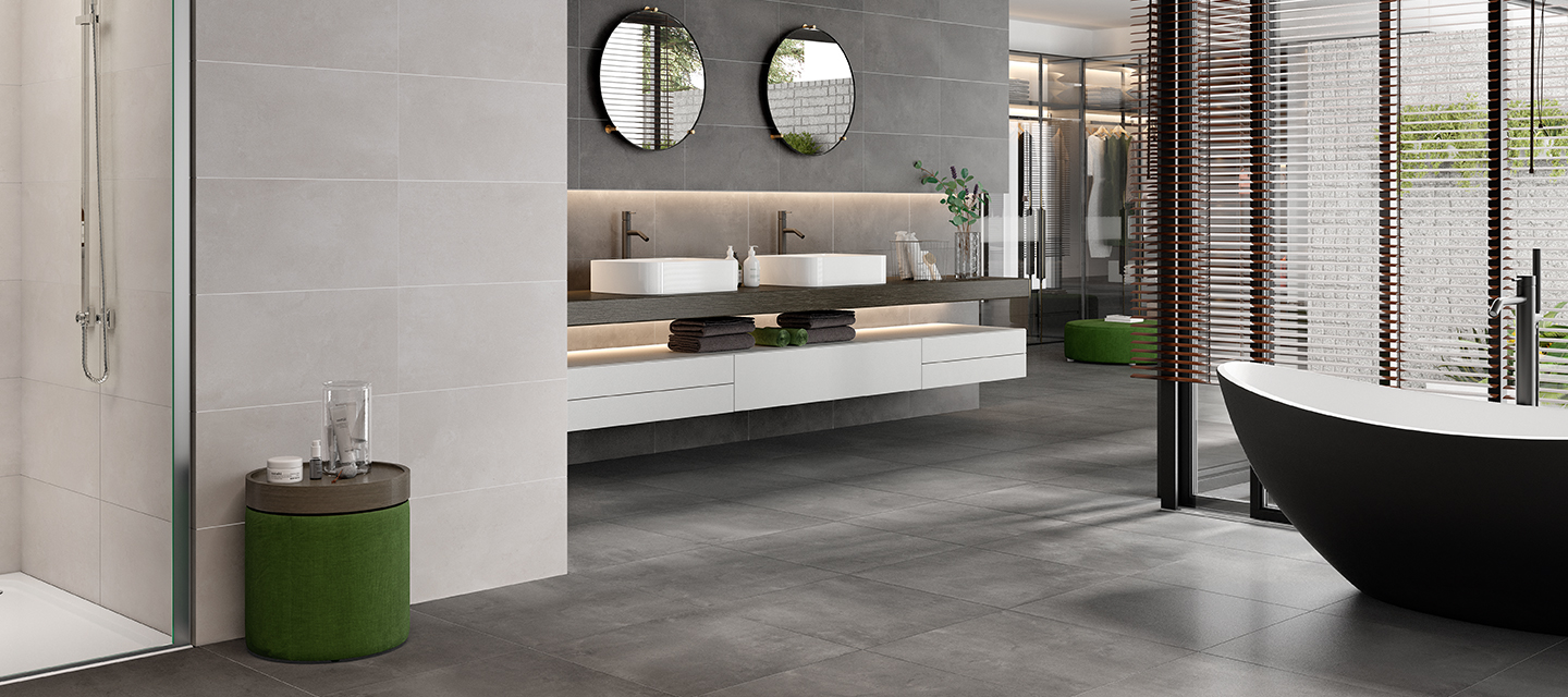 salle de bains moderne avec du carrelage gris