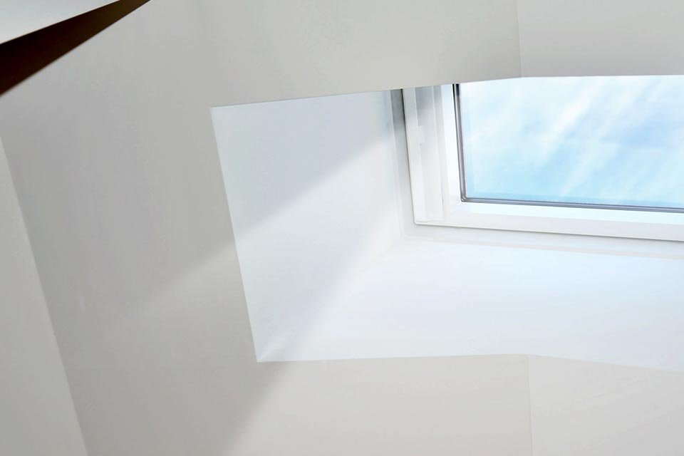 Fenêtre de toit plat à ouverture manuelle