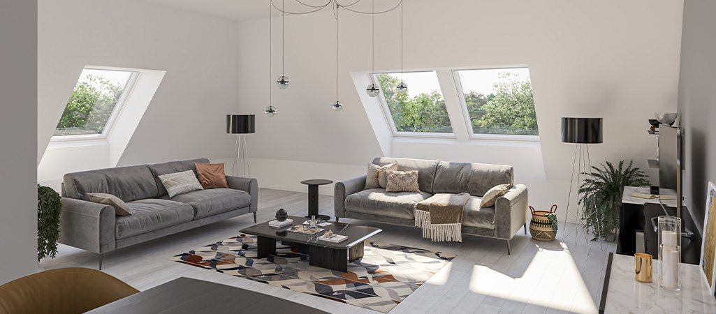 Salon lumineux avec quatre fenêtres VELUX Combinaison JUMO toit mansarde design contemporain